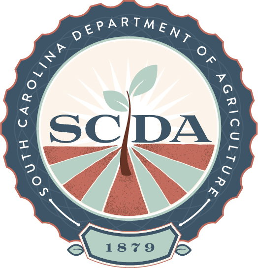 rounded seal of the Department of Agriculture featuring a depiction of green and brown fields