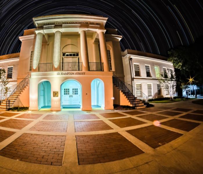 illuminated exterior of the Colleton county court house at night