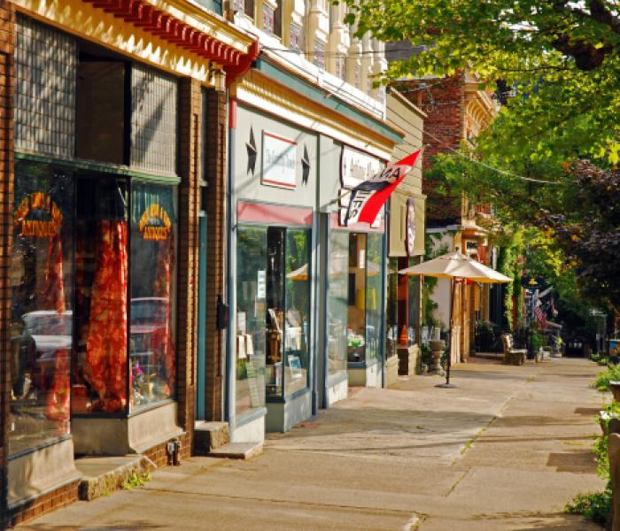 Store fronts and sidewalk in a historical town